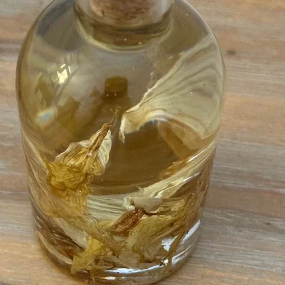 Unique Resin Decorative Bottle with Natural Dried Sunflower Petals - Picture 12 of 13